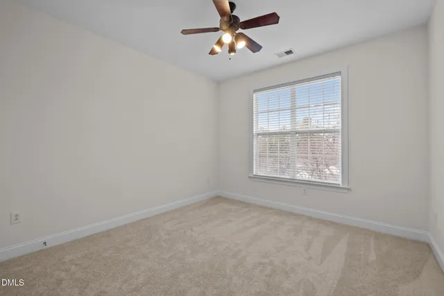 a garden view with a seating space