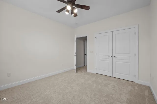 a view of a swimming pool with a bench