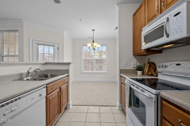a view of a balcony with wooden floor and fence