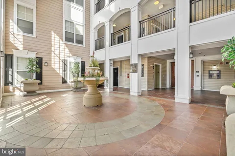 a view of a building with sitting area