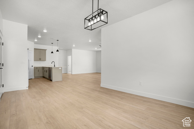 1631 West Century Lane, Unit B Mapleton, UT 84664 - Photo 10 of 33 Unfurnished living room with light wood-type flooring and recessed lighting