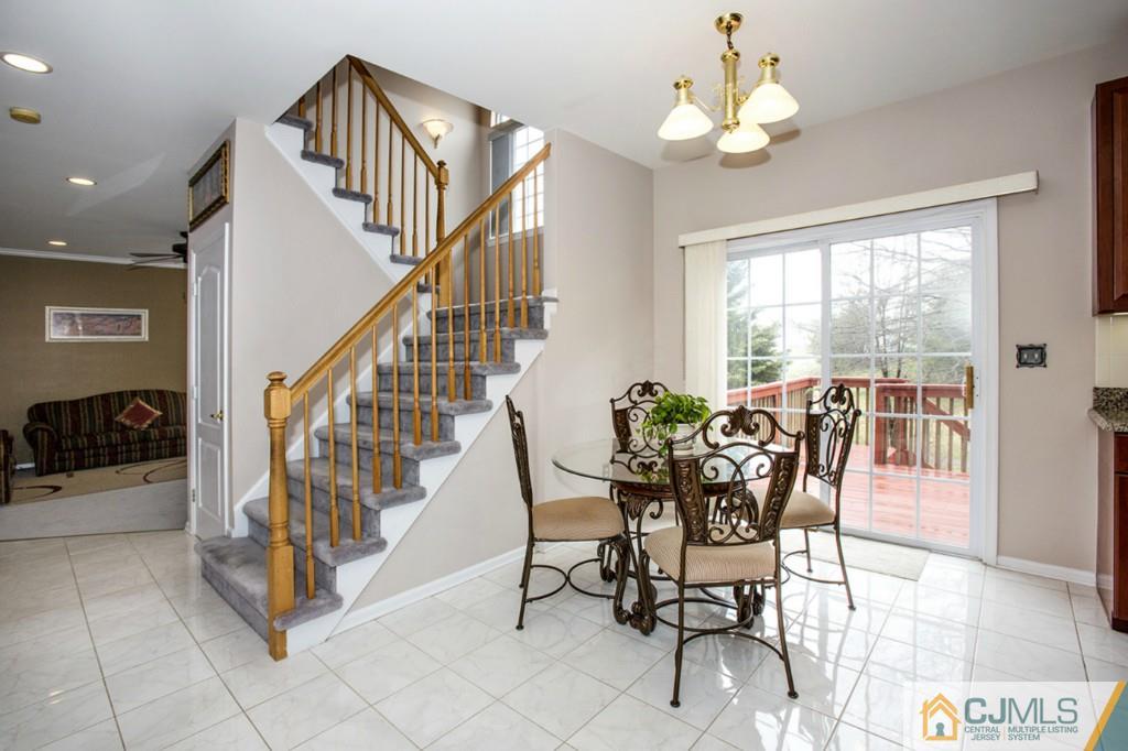 27 Timber Ridge Road North Brunswick, NJ 08902 - Photo 11 of 25 a view of a dining room with furniture window and outside view