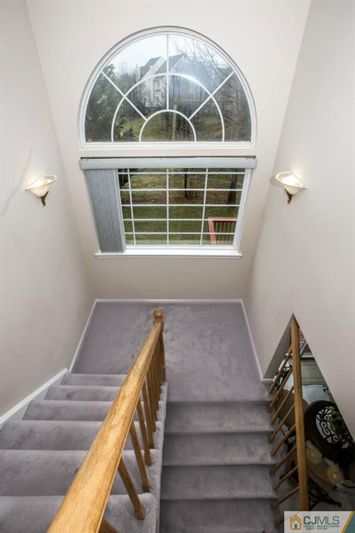 27 Timber Ridge Road North Brunswick, NJ 08902 - Photo 20 of 25 a view of entryway with wooden floor
