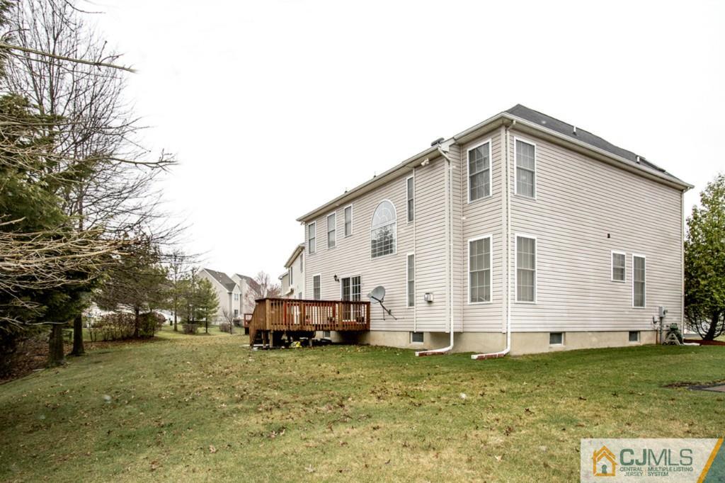 27 Timber Ridge Road North Brunswick, NJ 08902 - Photo 25 of 25 a view of a house with backyard