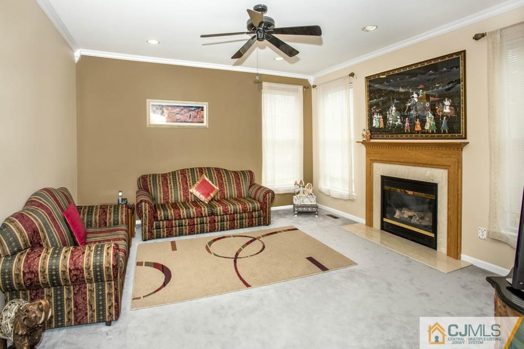 27 Timber Ridge Road North Brunswick, NJ 08902 - Photo 5 of 25 a living room with furniture