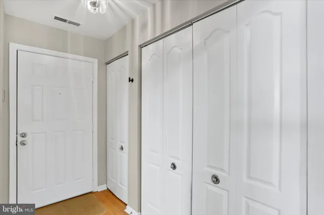 a view of a bathroom with a shower curtain