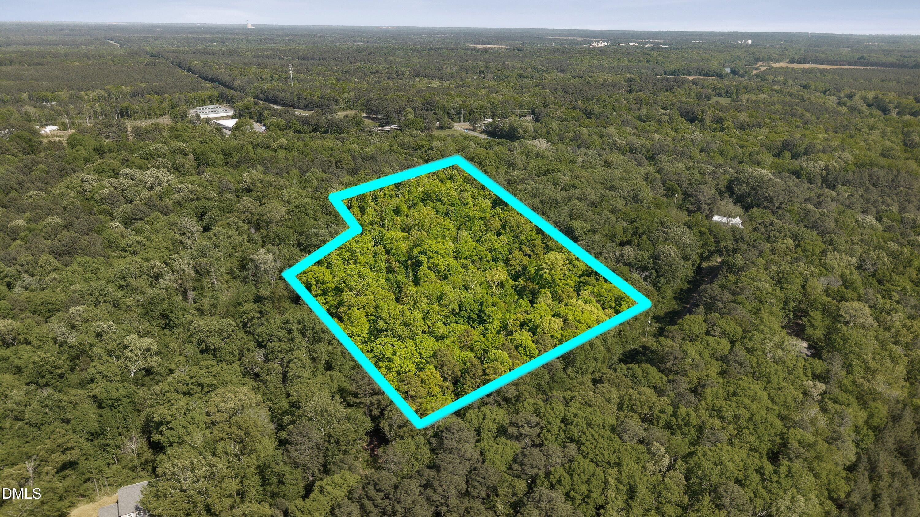 571 Water Tower Road Moncure, NC 27559 - Photo 2 of 7 a view of a small yard