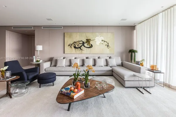 a living room with furniture and a couch