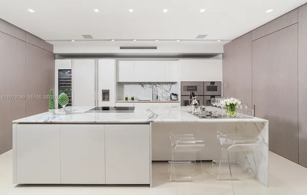 a close view of sink and a granite counter top