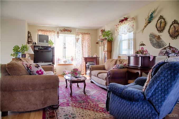 951 Copella Road Bath, PA 18014 - Photo 5 of 25 a living room with furniture and a large window