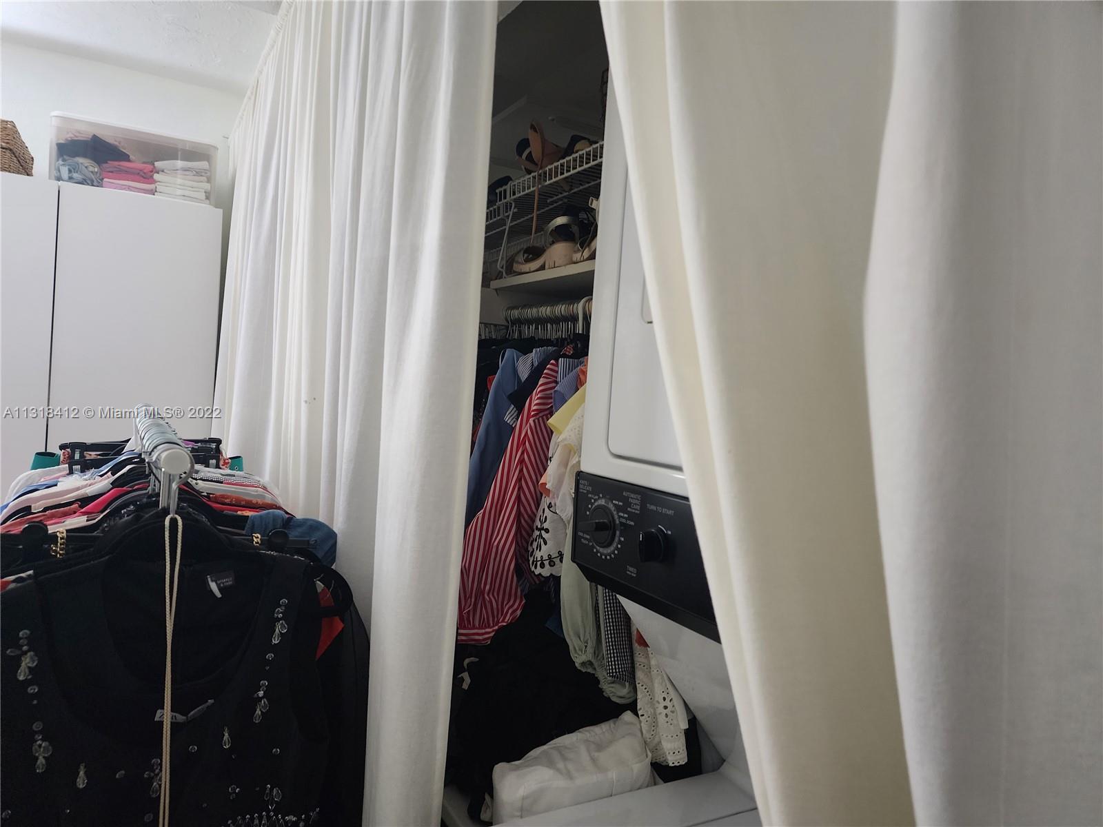 8600 Southwest 67th Avenue, Unit 906 Pinecrest, FL 33156 - Photo 25 of 27 a view of walk in closet