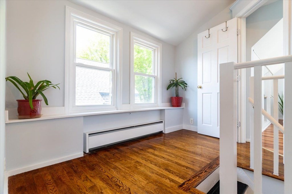 6 Malverna Road Boston, MA 02131 - Photo 17 of 29 a very nice looking room with a large window