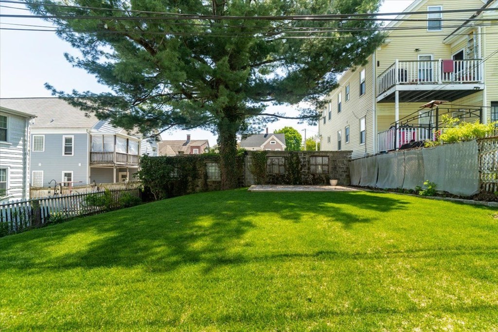 6 Malverna Road Boston, MA 02131 - Photo 24 of 29 a view of a house with a yard