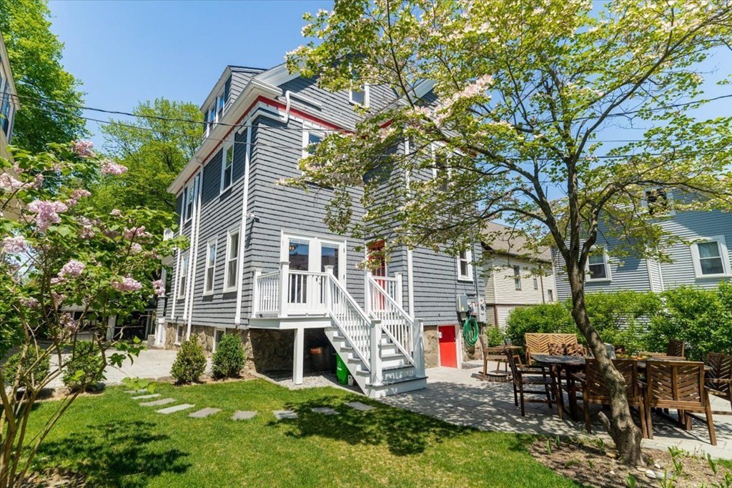 6 Malverna Road Boston, MA 02131 - Photo 25 of 29 a view of a house with backyard and sitting area