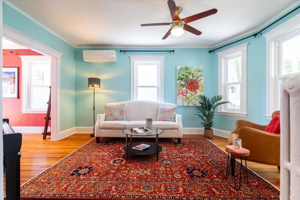 6 Malverna Road Boston, MA 02131 - Photo 7 of 29 a living room with furniture and a potted plant