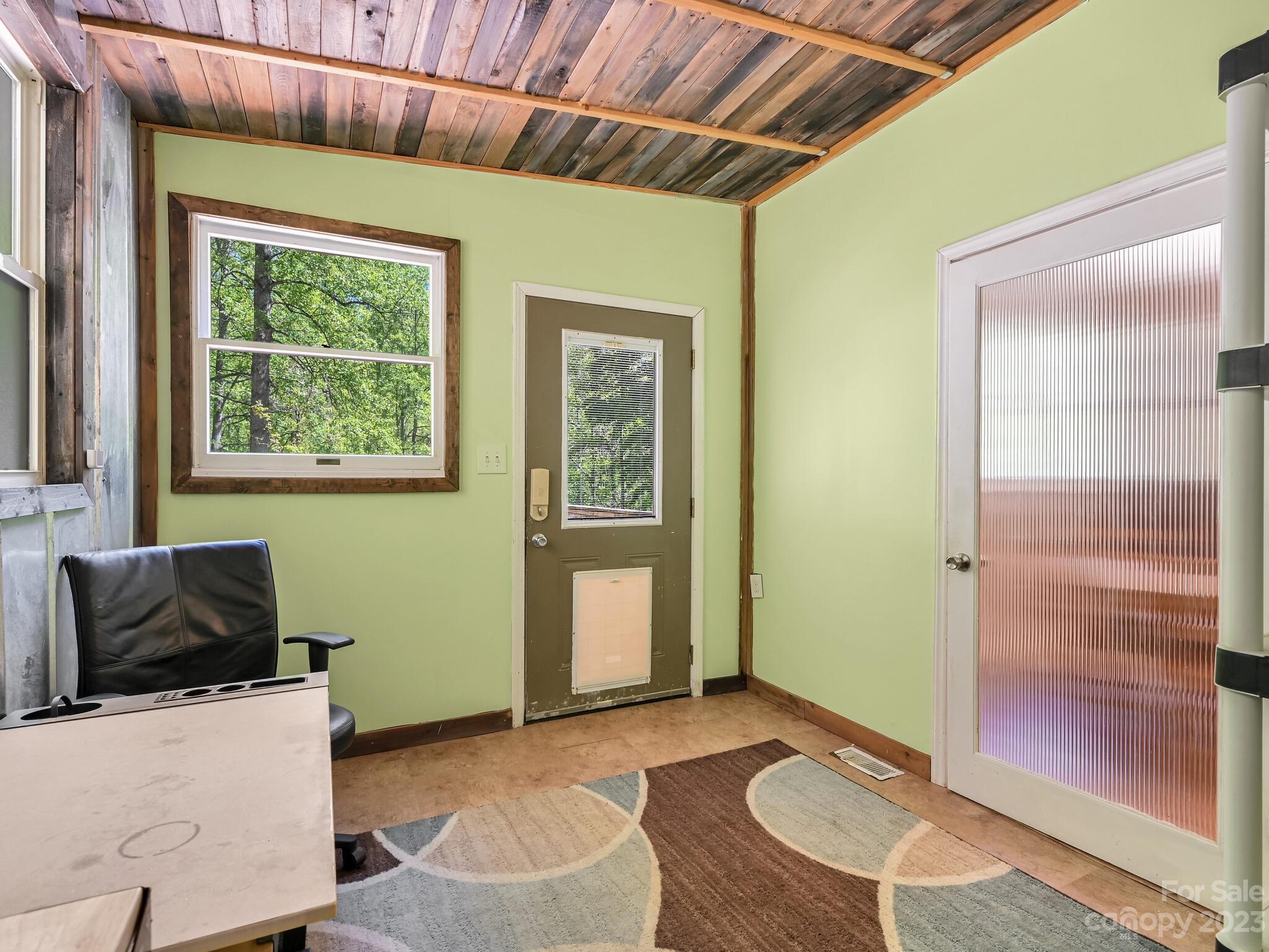 843 North Fork Road Barnardsville, NC 28709 - Photo 14 of 37 a living room with a couch and a window