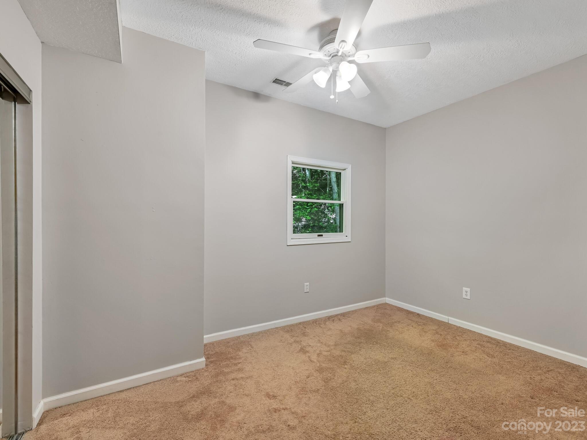 843 North Fork Road Barnardsville, NC 28709 - Photo 22 of 37 an empty room with a window