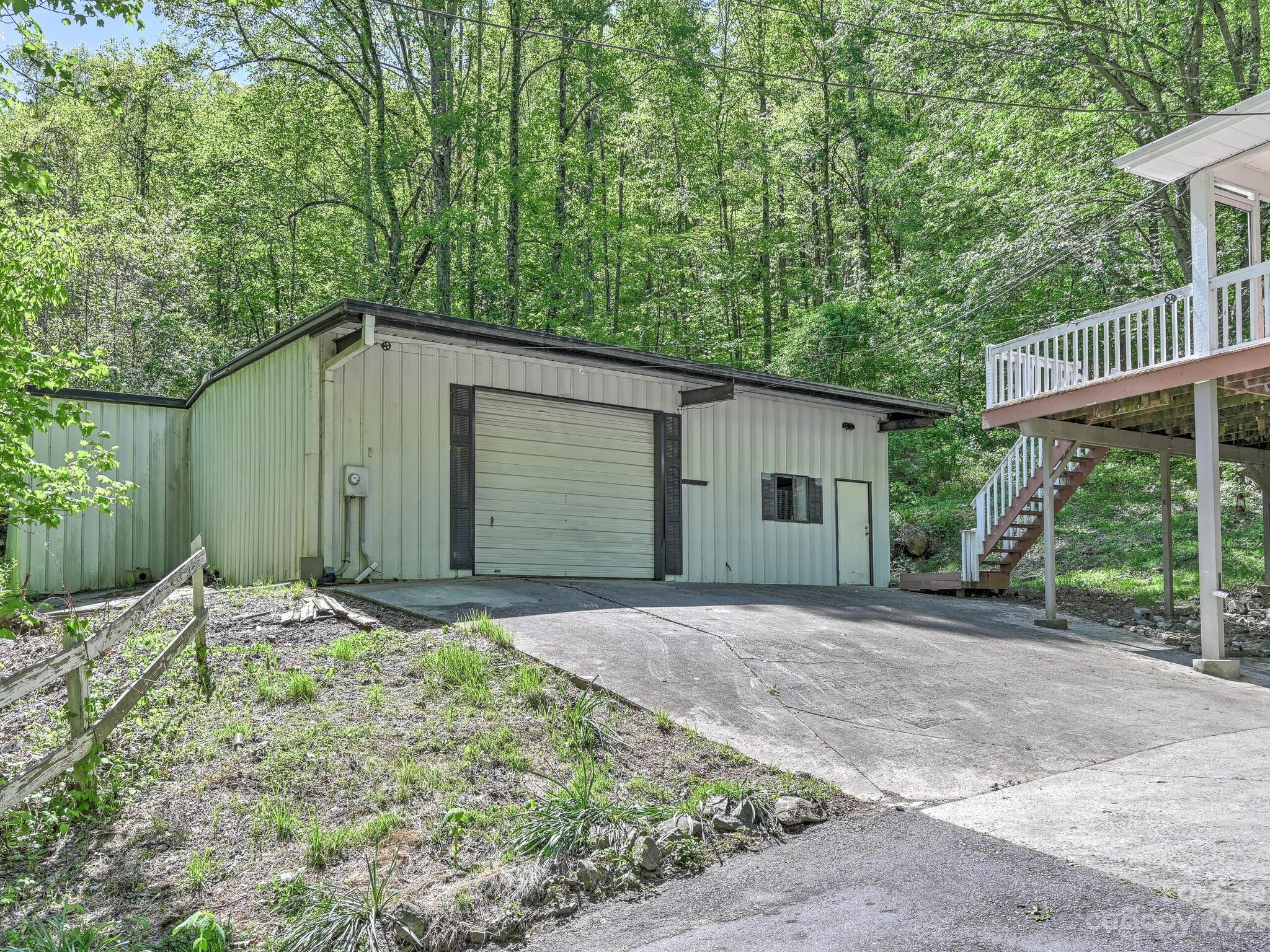 843 North Fork Road Barnardsville, NC 28709 - Photo 30 of 37 a house with a tree in the background