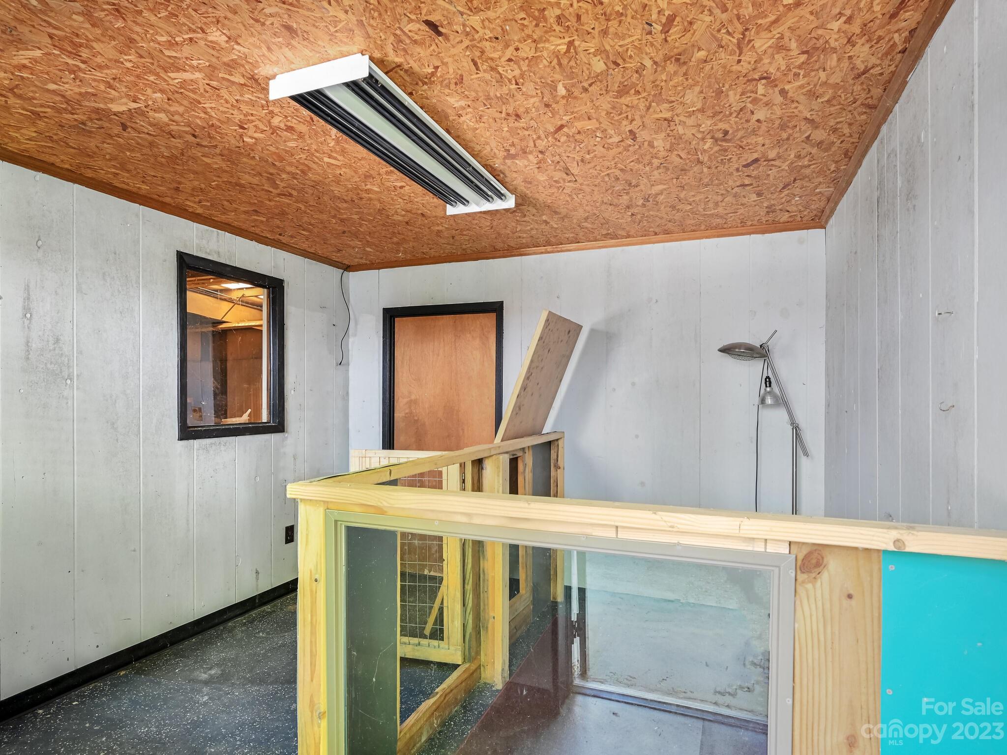 843 North Fork Road Barnardsville, NC 28709 - Photo 32 of 37 a bathroom with a sink a mirror and vanity