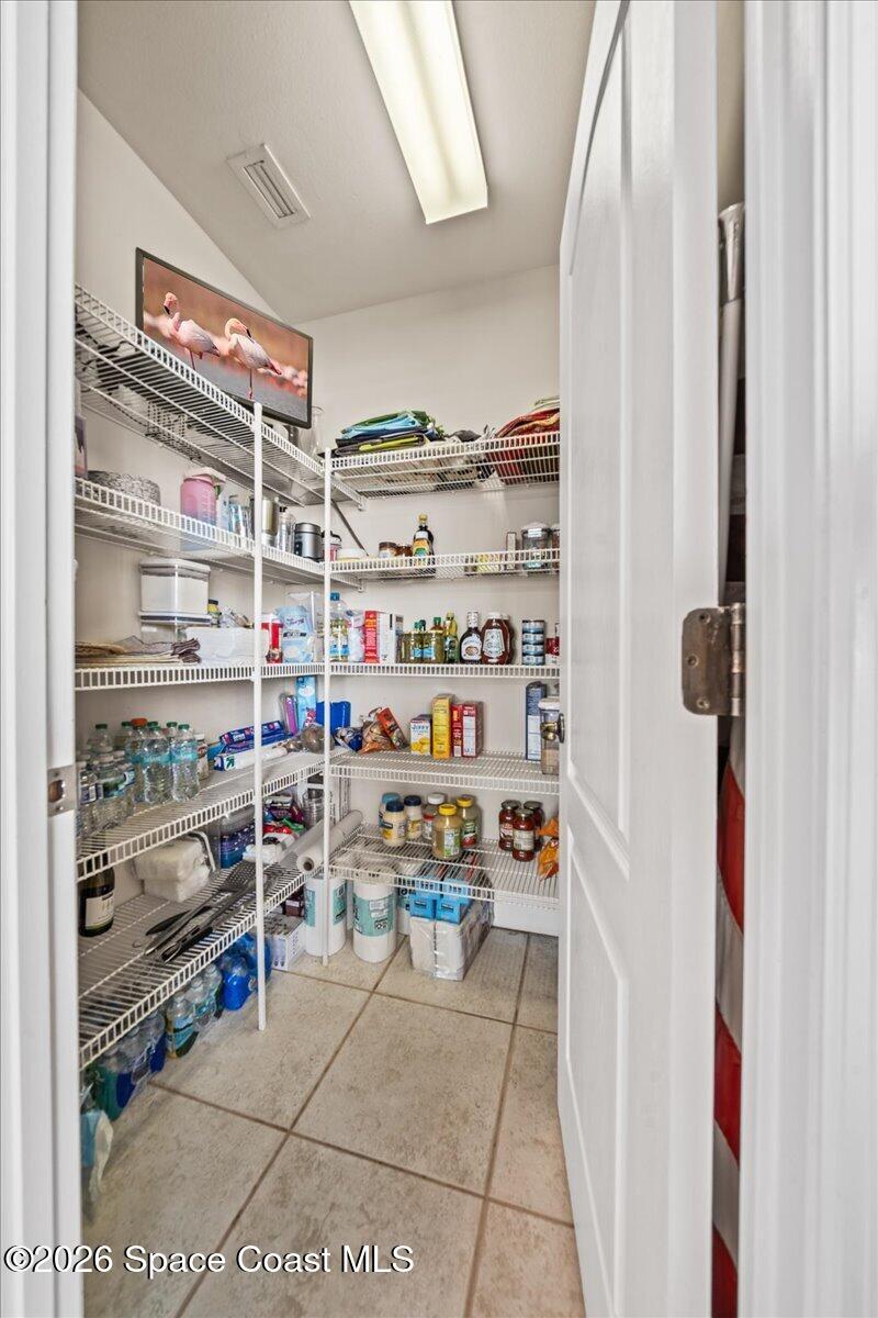 1050 Starling Way Rockledge, FL 32955 - Photo 15 of 59 a room with storage and utility