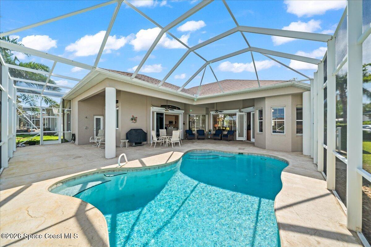1050 Starling Way Rockledge, FL 32955 - Photo 34 of 59 a view of a house with backyard and sitting area