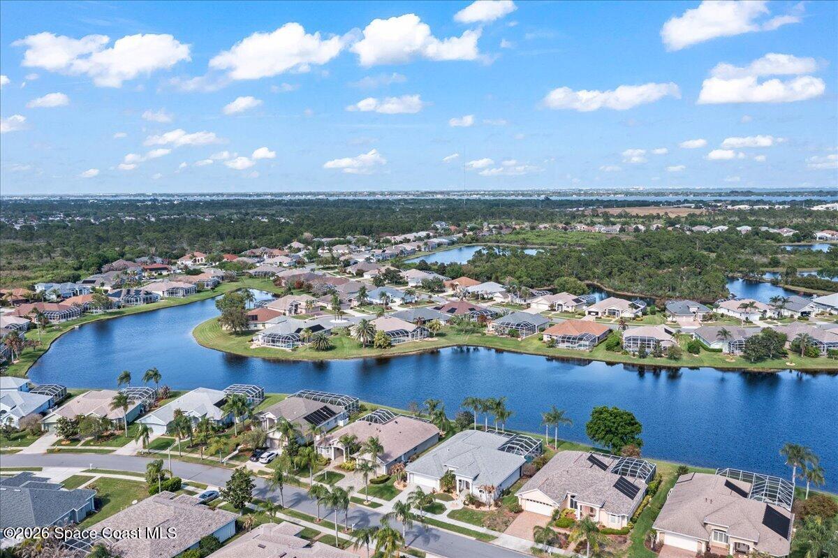 1050 Starling Way Rockledge, FL 32955 - Photo 49 of 59 an aerial view of a houses with outdoor seating