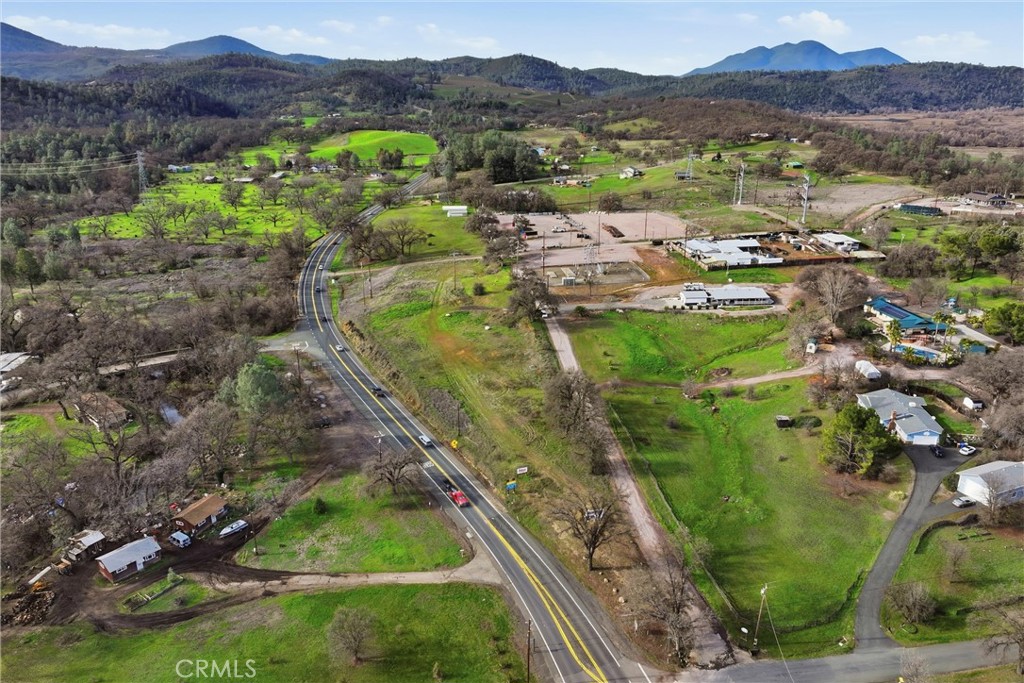 9560 Highway 29 Lower Lake, CA 95457 - Photo 6 of 8 a view of a lake with a mountain