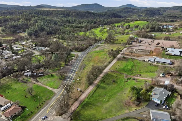 an aerial view of a golf course with a garden