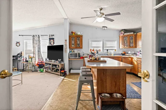 a view of a living room and dining room