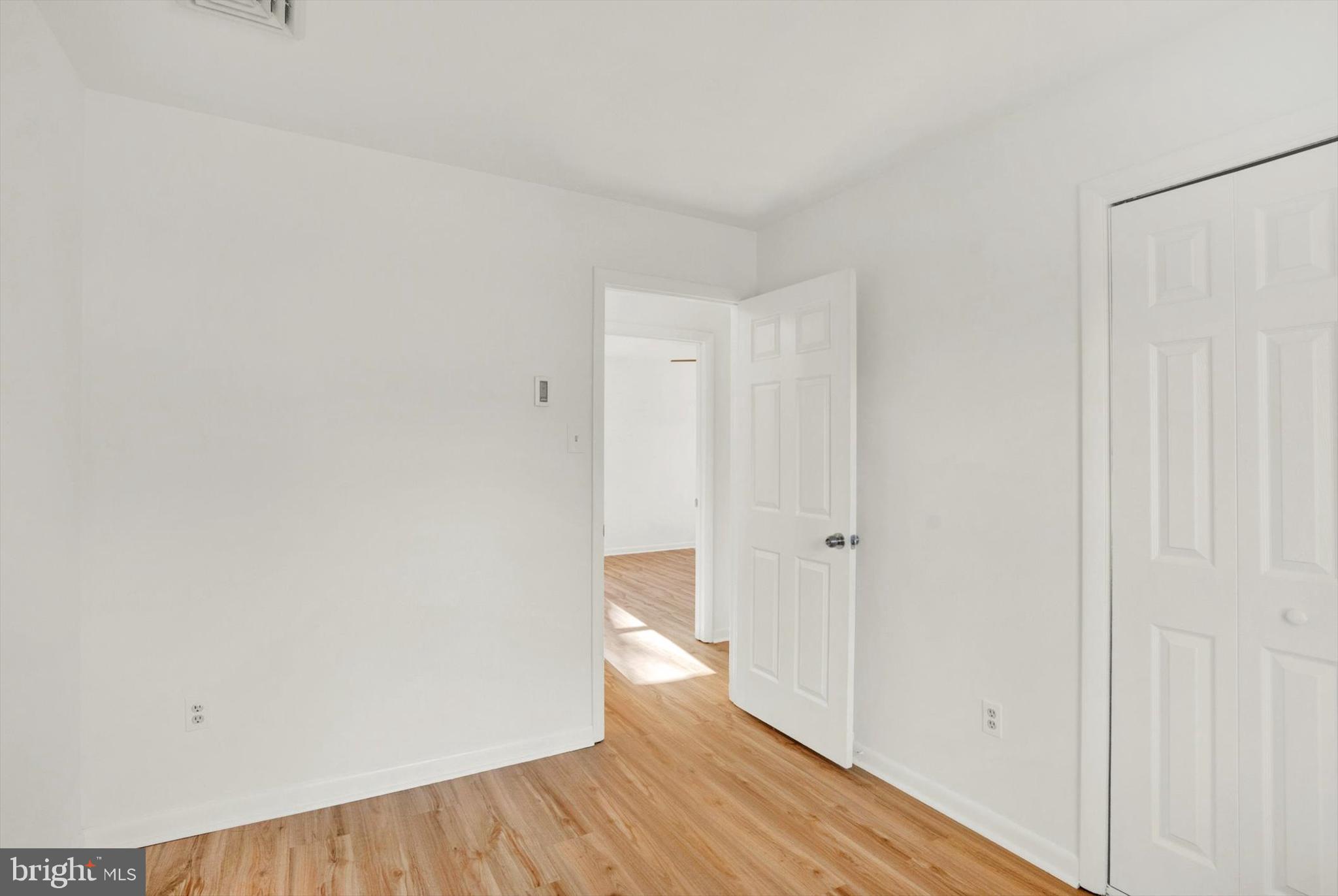 5400 Curley Hill Road Doylestown, PA 18902 - Photo 12 of 47 a view of empty room with wooden floor
