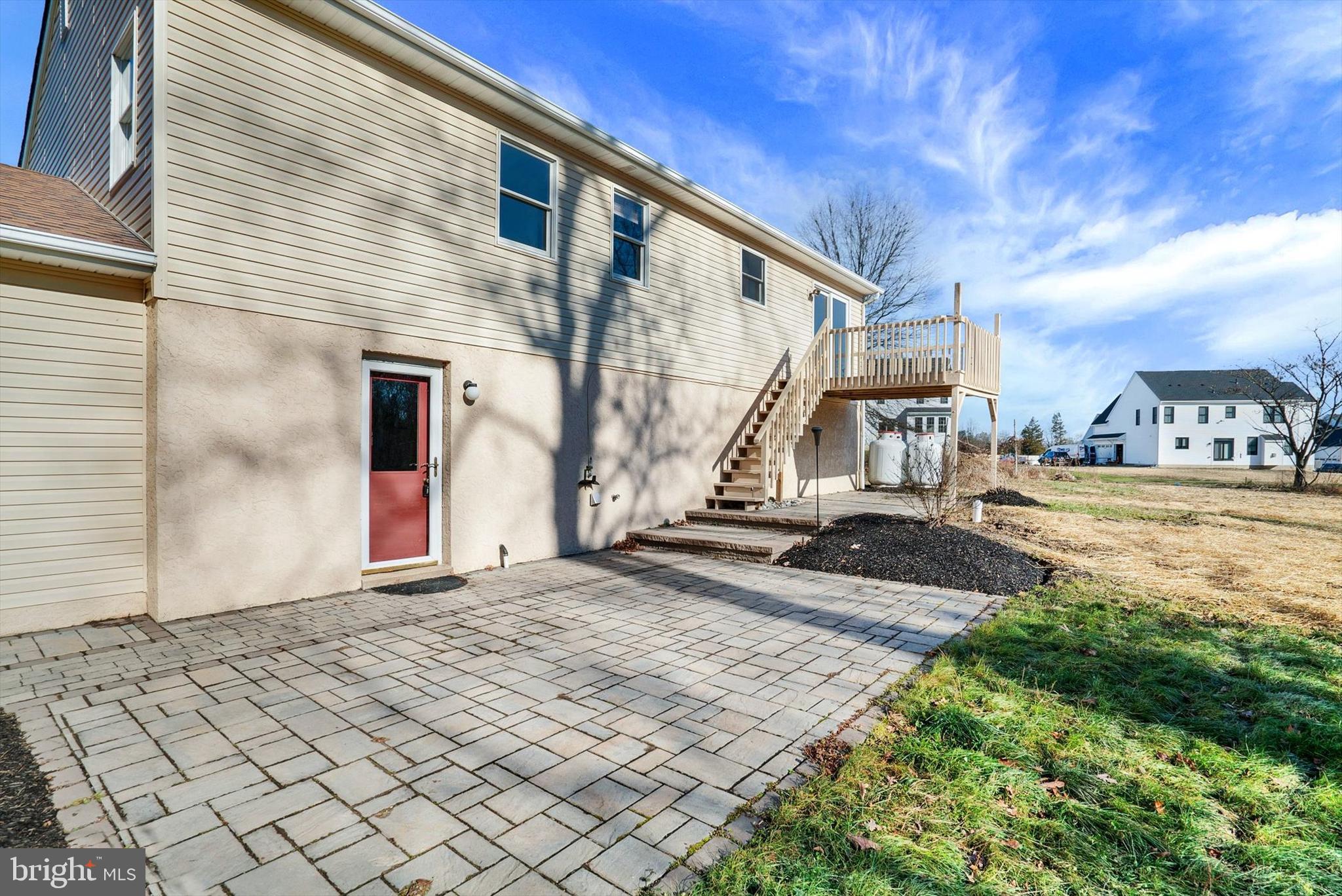 5400 Curley Hill Road Doylestown, PA 18902 - Photo 25 of 47 a view of a house with backyard and a tree