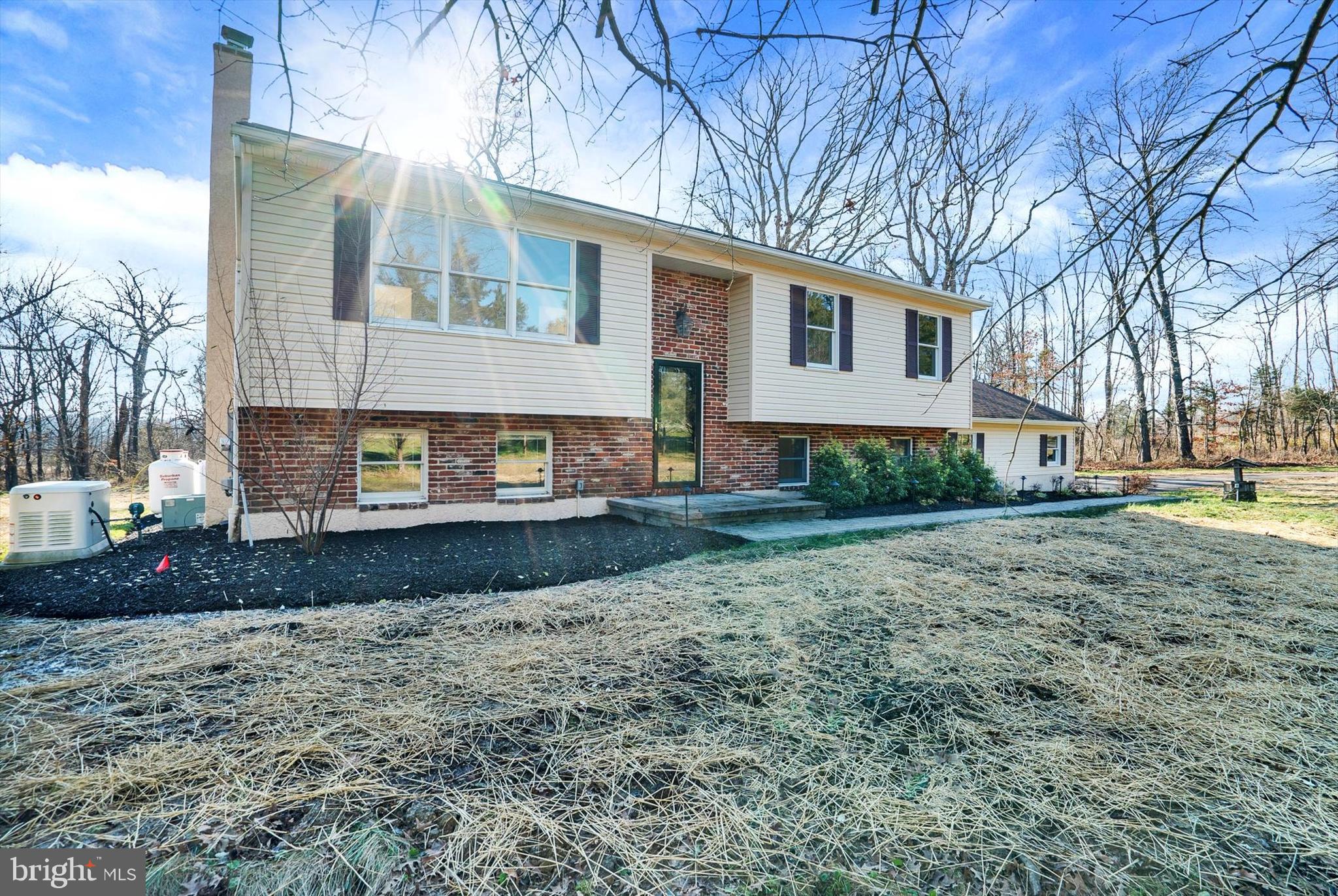 5400 Curley Hill Road Doylestown, PA 18902 - Photo 30 of 47 a view of a house with a yard