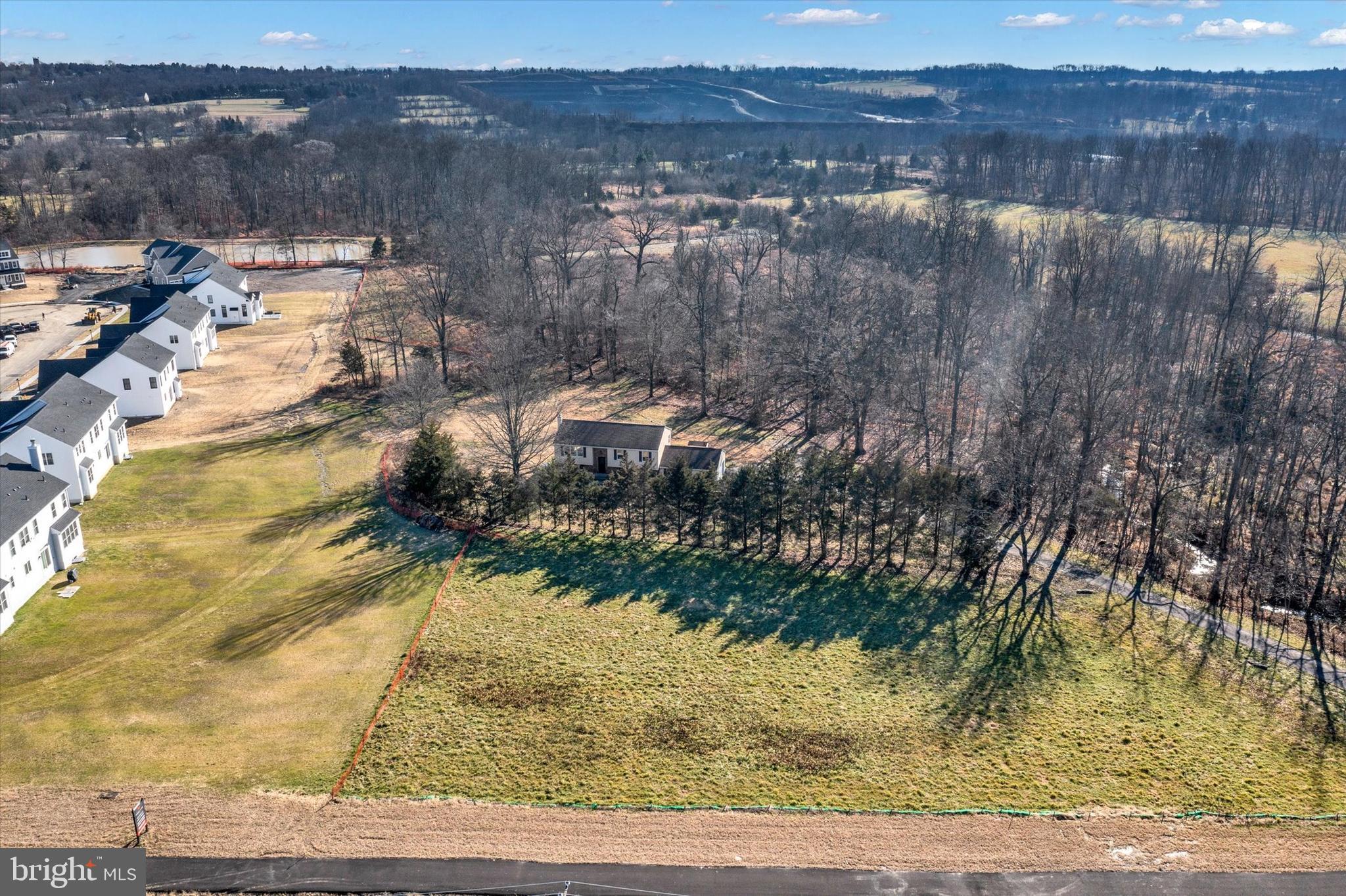 5400 Curley Hill Road Doylestown, PA 18902 - Photo 35 of 47 a view of a lake from a yard