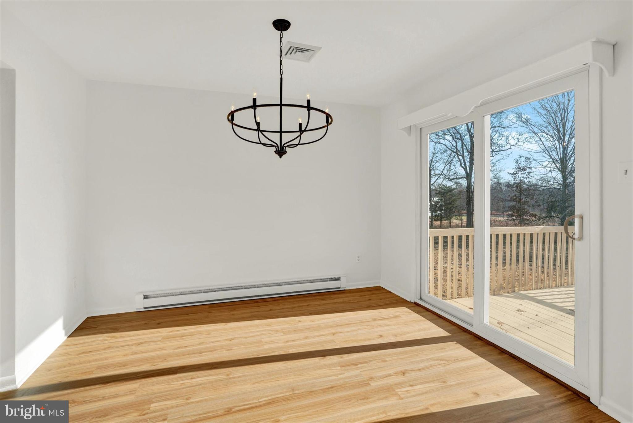 5400 Curley Hill Road Doylestown, PA 18902 - Photo 4 of 47 a view of empty room with windows