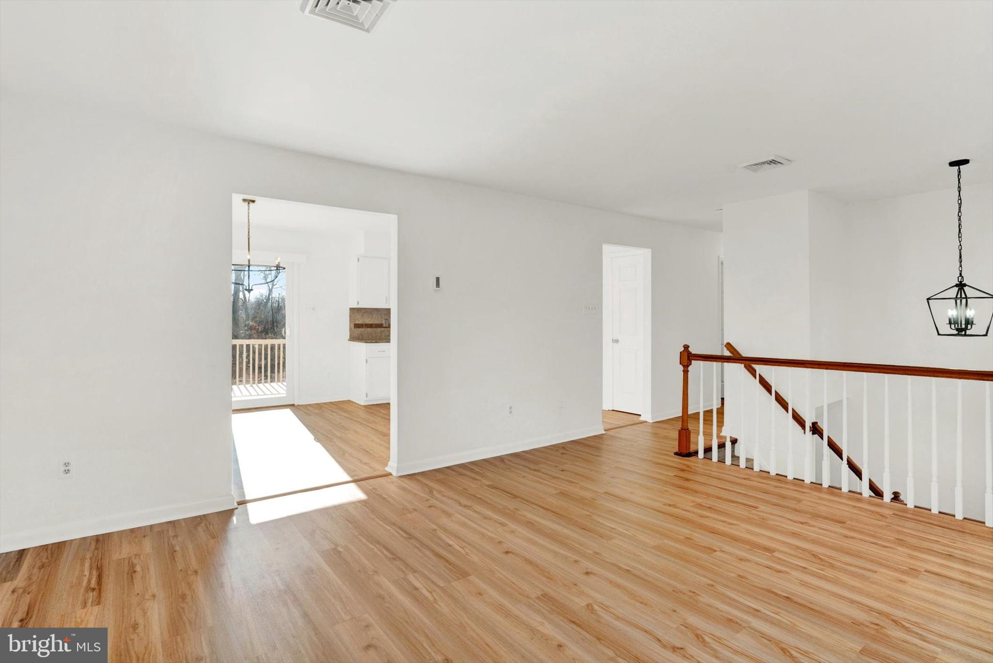 5400 Curley Hill Road Doylestown, PA 18902 - Photo 9 of 47 a view of empty room with wooden floor