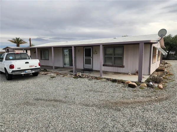 a car parked in front of a house