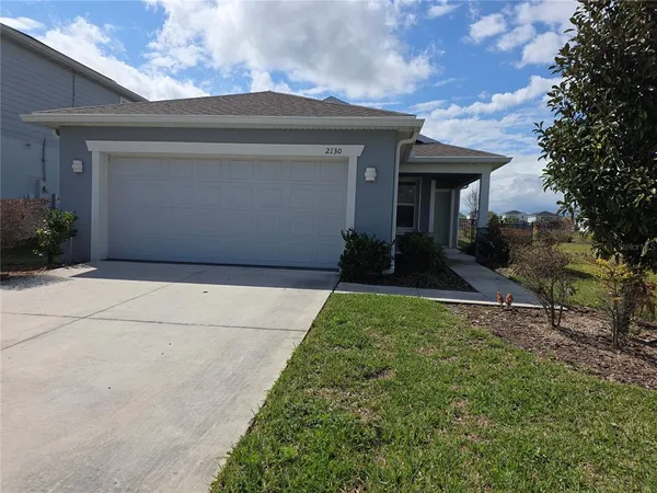 a front view of house with yard