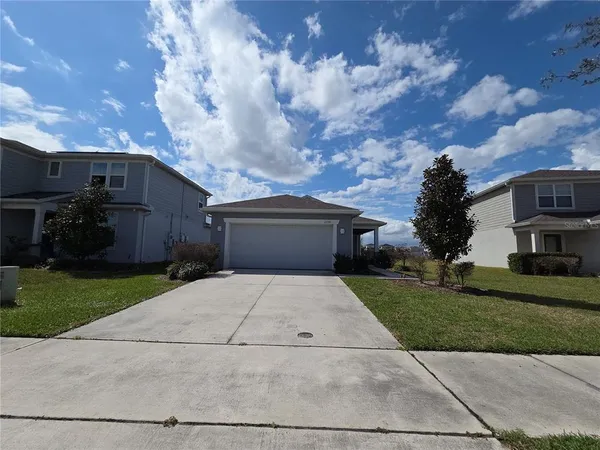 a front view of house with yard