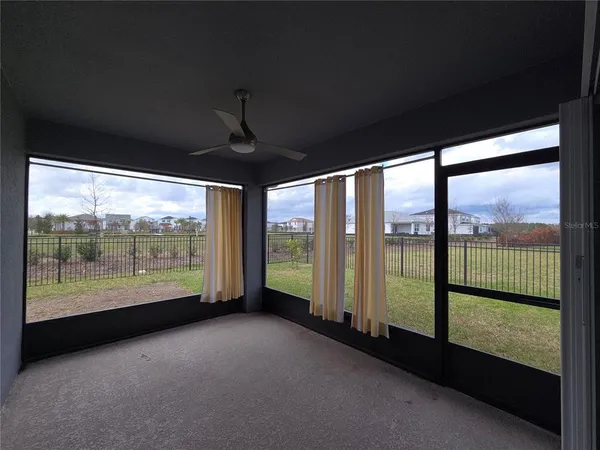 a view of a backyard with a garden and plants