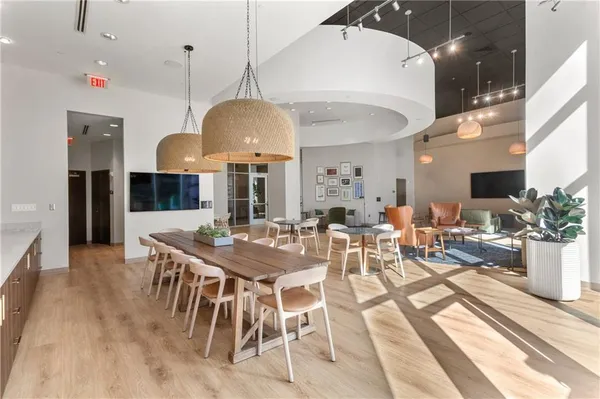a group of potted plants sitting in front of a building