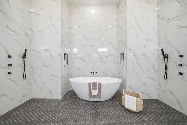a utility room with sink dryer and washer