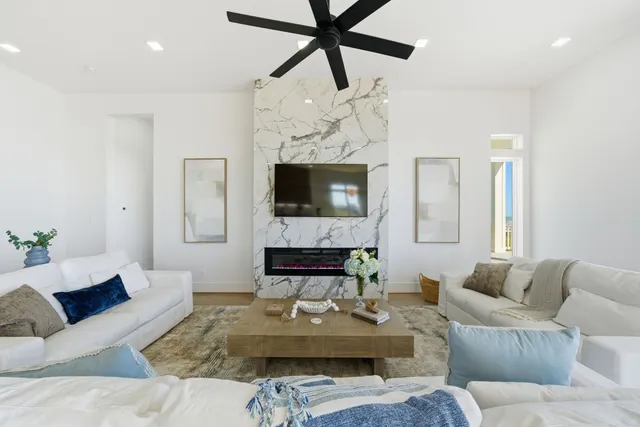 a spacious bathroom with a double vanity sink a mirror and a shower