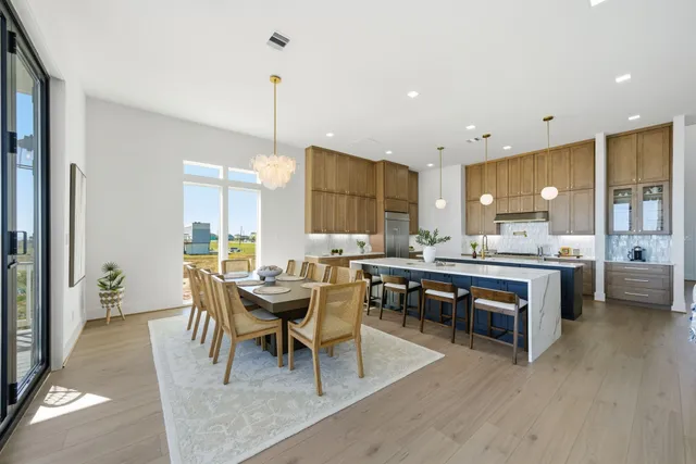 a spacious bathroom with a double vanity sink and a mirror