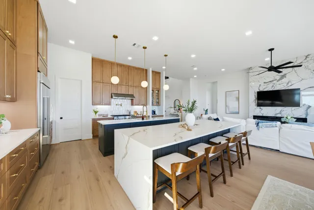 a spacious bathroom with a bathtub and shower