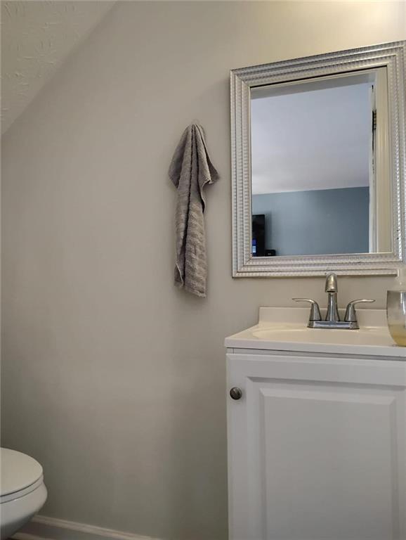 3073 Shadow Walk Lane Tucker, GA 30084 - Photo 22 of 48 a bathroom with a sink vanity and toilet
