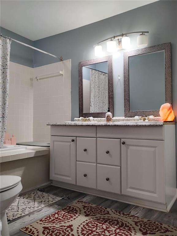 3073 Shadow Walk Lane Tucker, GA 30084 - Photo 25 of 48 a bathroom with a granite countertop sink and a mirror