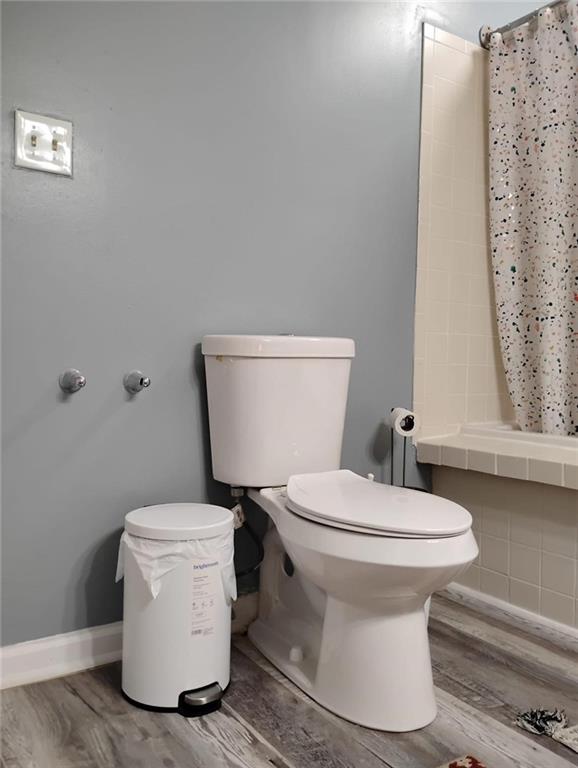 3073 Shadow Walk Lane Tucker, GA 30084 - Photo 32 of 48 a white toilet sitting next to a white sink