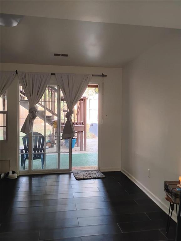 3073 Shadow Walk Lane Tucker, GA 30084 - Photo 35 of 48 an empty room with wooden floor and windows