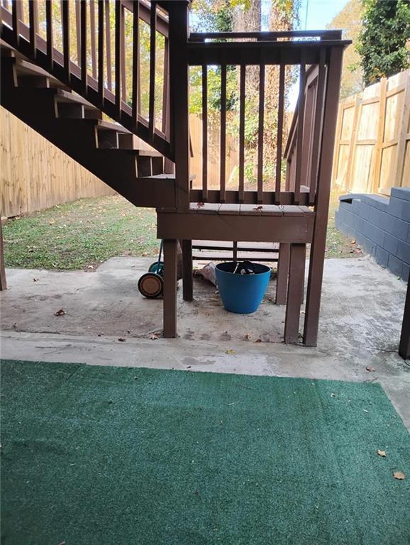 3073 Shadow Walk Lane Tucker, GA 30084 - Photo 46 of 48 a view of a porch with a bench in the yard