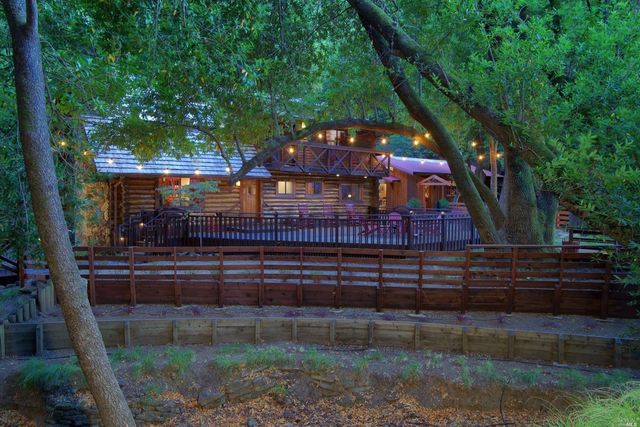 a view of house with yard